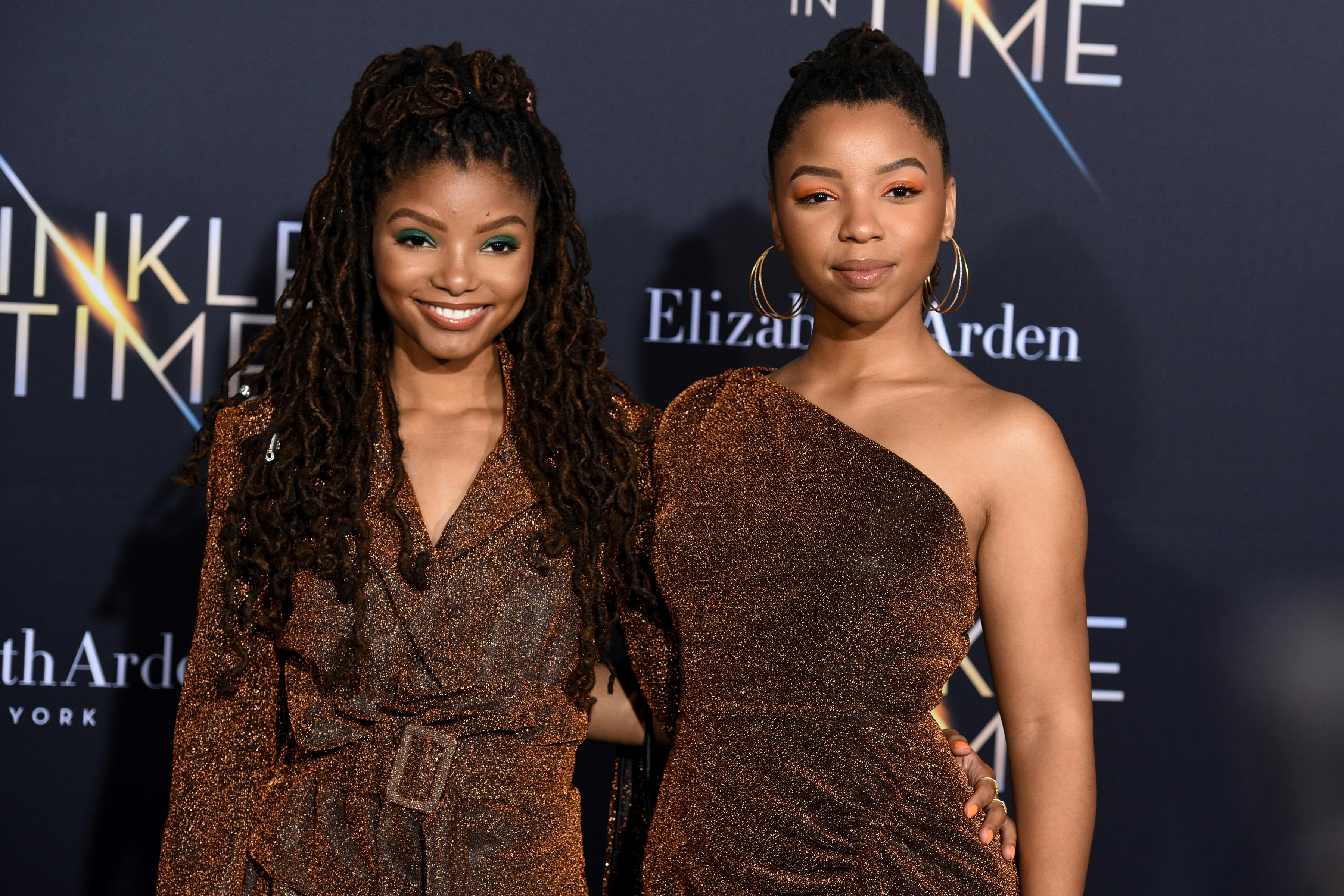 LOS ANGELES, CA - FEBRUARY 26:  Halle Bailey and Chloe Bailey attend Premiere Of Disney's "A Wrinkle...