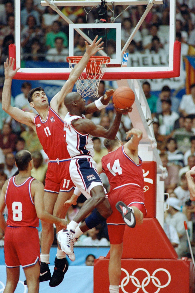 American basketball star Michael Jordan smashes during the final of the 1992 Barcelona Olympic baske...
