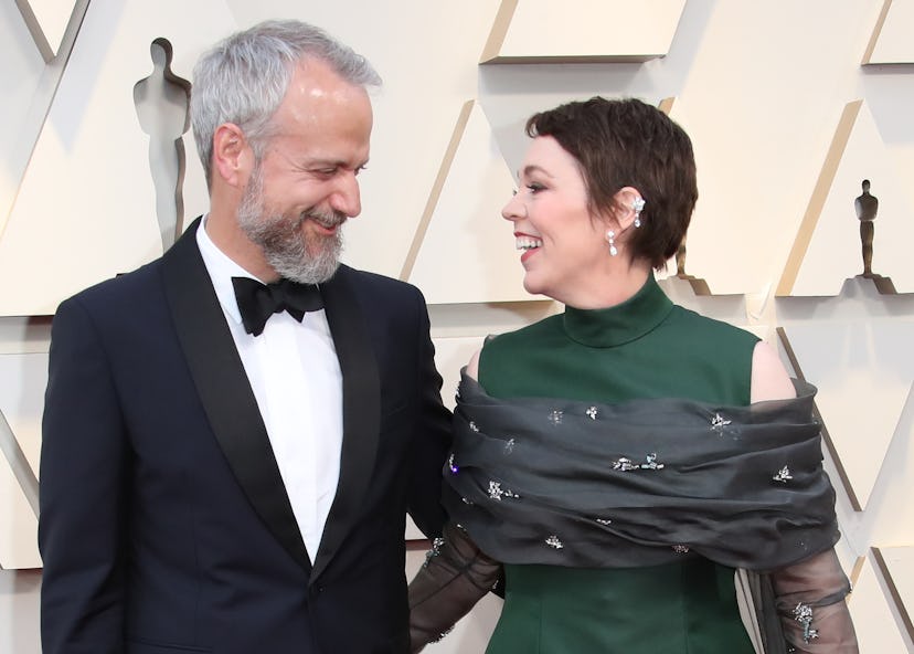 HOLLYWOOD, CA - FEBRUARY 24: Ed Sinclair and Olivia Colman attend the 91st Annual Academy Awards at ...