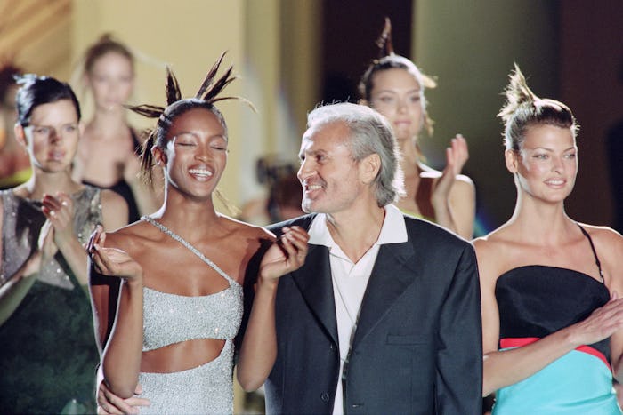 Italian fashio, designer Gianni Versace, with models, British Naomi Campbell and Canadian Linda Evan...