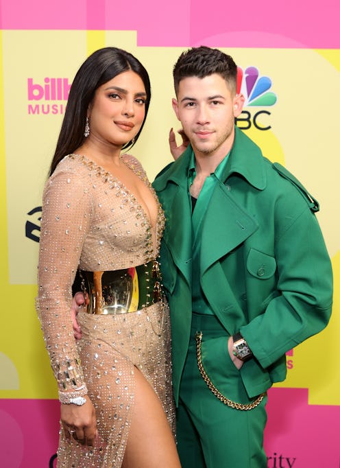 LOS ANGELES, CALIFORNIA - MAY 23: (L-R) Priyanka Chopra Jonas and Nick Jonas pose backstage for the ...