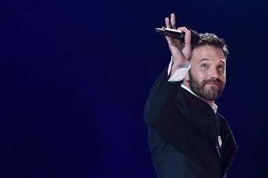 US actor Ben Affleck waves as he walks off stage after speaking during the taping of the "Vax Live" ...