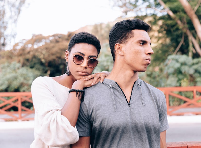 Couple posing outdoors