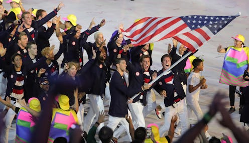 Michael Phelps carries the flag for Team USA during Parade of Nations in 2016.
