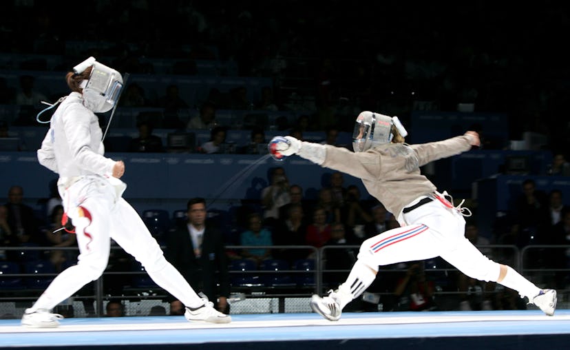 Mariel Zagunis of the United States defeats Xue Tan of China for the gold medal in the Women's Indiv...