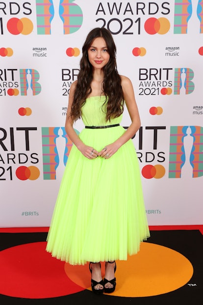  Olivia Rodrigo arrives at The BRIT Awards 2021 wearing a green tulle dress in London, England. (Pho...