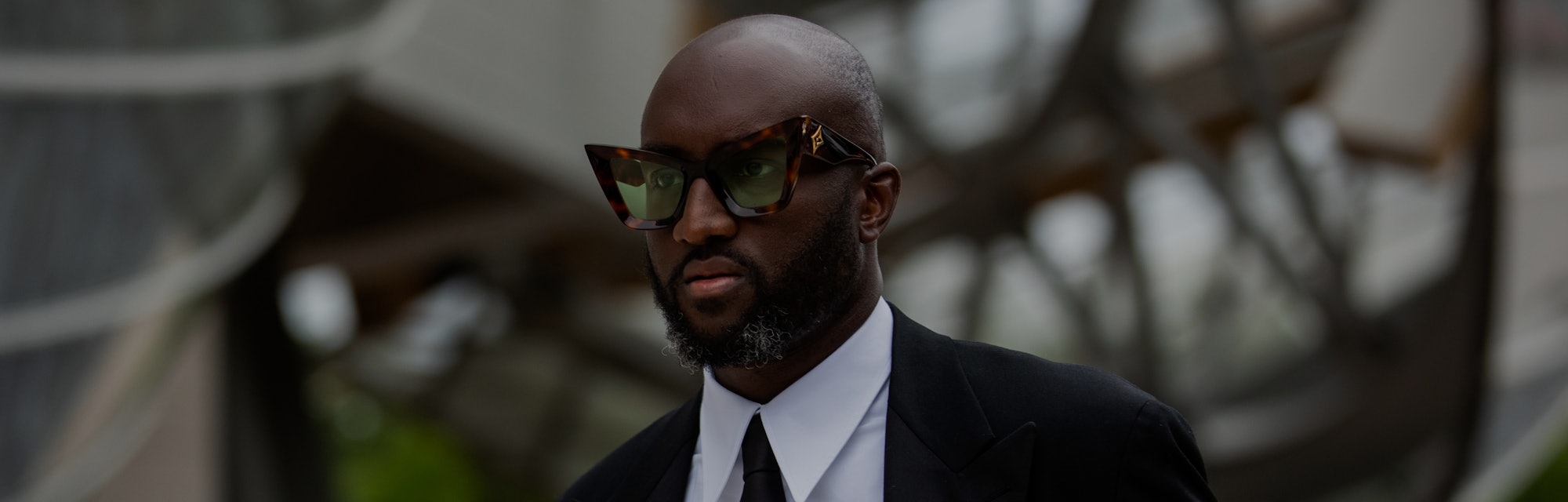 PARIS, FRANCE - JULY 05: Virgil Abloh is seen wearing tie and suit, white button shirt, sunglasses o...