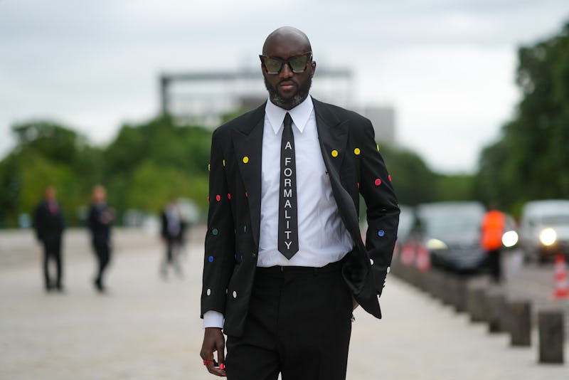 PARIS, FRANCE - JULY 05: Virgil Abloh wears a white shirt, a black tie with 'A Formality' slogan, a ...