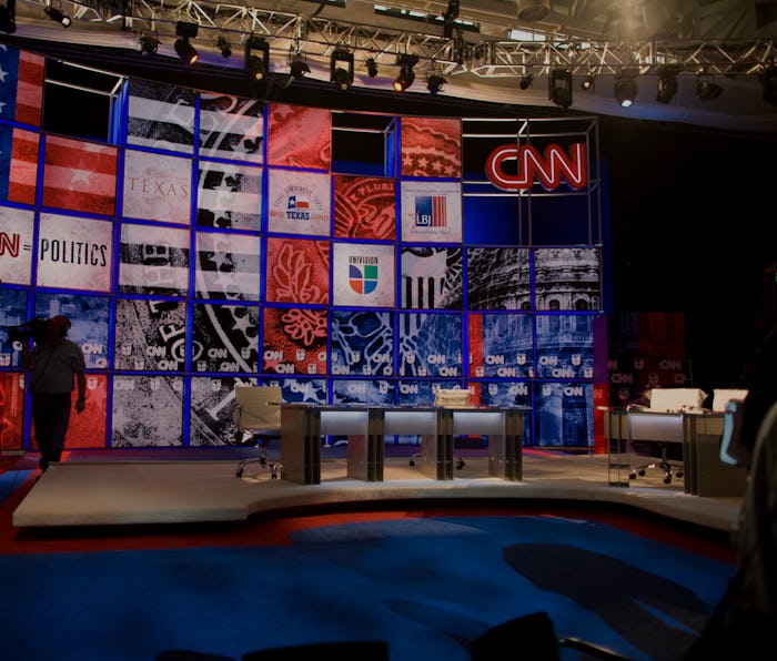 A camera man walks through the set, during the preview of the CNN set where Democratic candidates Ba...