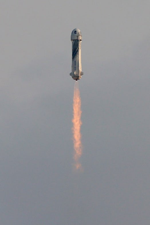 VAN HORN, TEXAS - JULY 20:  The New Shepard Blue Origin rocket lifts-off from the launch pad carryin...