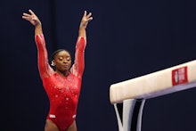 ST LOUIS, MISSOURI - JUNE 27: Simone Biles competes on the balance beam during the Women's competiti...