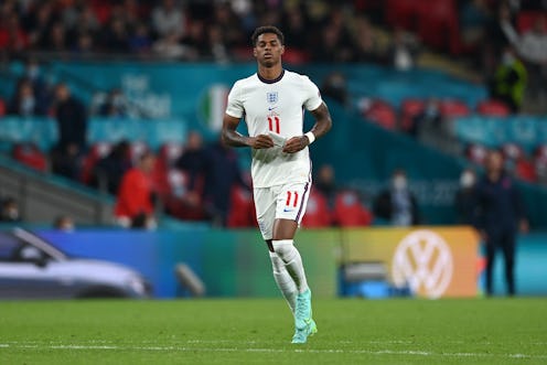 LONDON, ENGLAND - JULY 11: Marcus Rashford of England reacts after missing their team's third penalt...