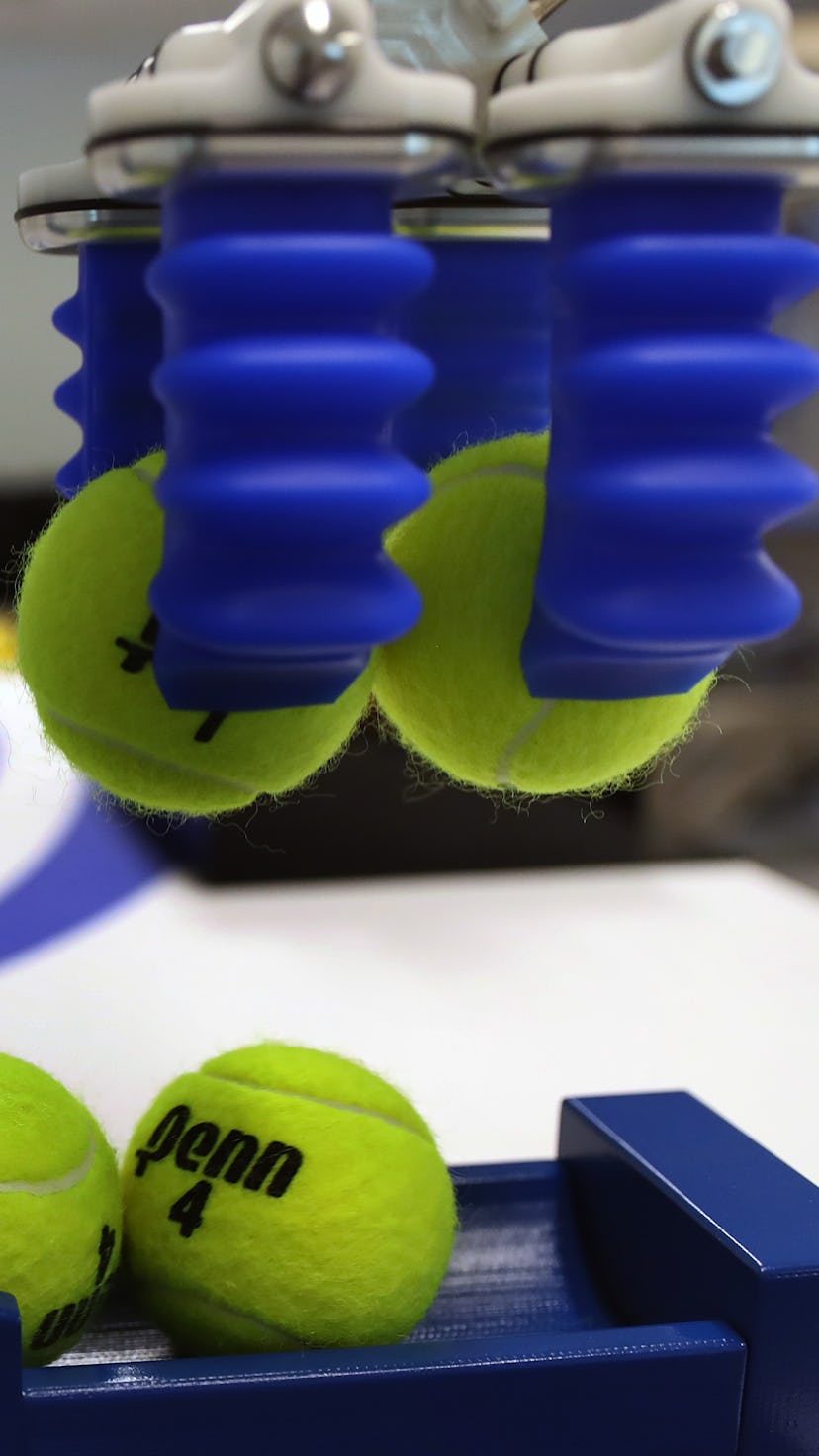 BEDFORD, MA - MAY 20: A soft robotics device works with tennis balls in Bedford, MA on May 20, 2019....
