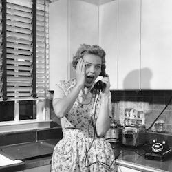 A housewife talking on the telephone in the kitchen gasps. Experts explain how to get rid of a toxic...