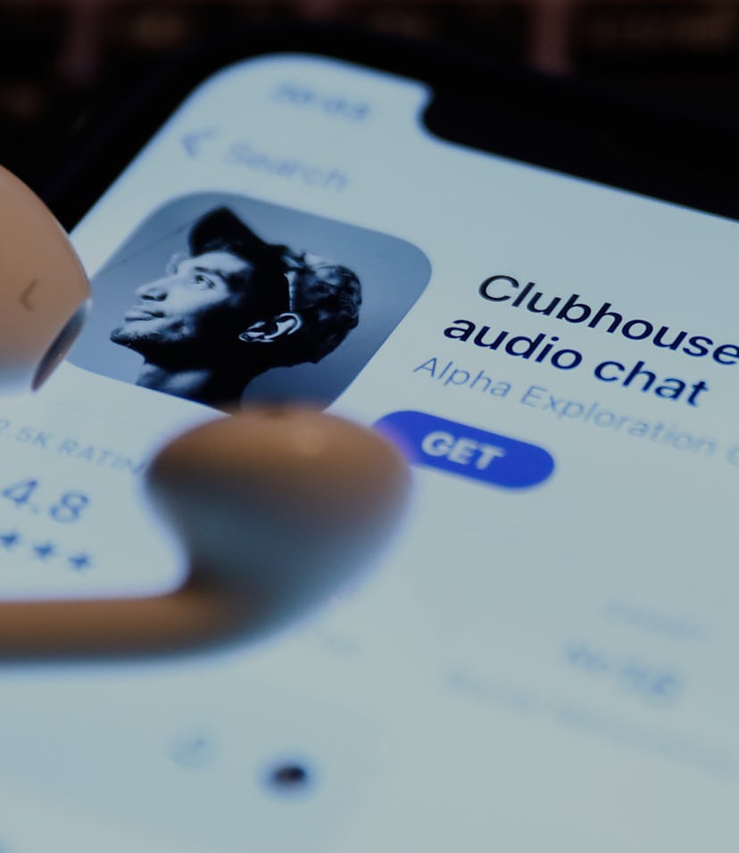 Clubhouse Drop-in audio chat app logo on the App Store is seen displayed on a phone screen in this i...