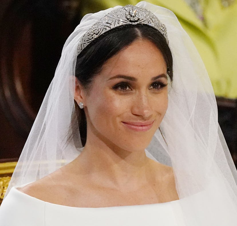 US fiancee of Britain's Prince Harry, Meghan Markle arrives at the High Altar for their wedding cere...