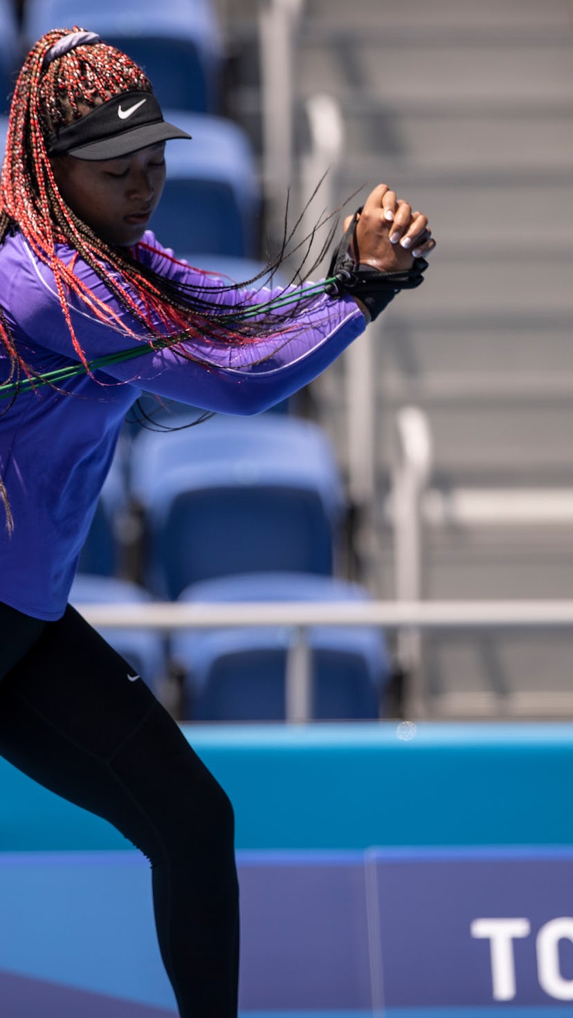TOKYO, JAPAN - JULY 20: Naomi Osaka of Team Japan trains in Center Court Ariake Tennis Park ahead of...