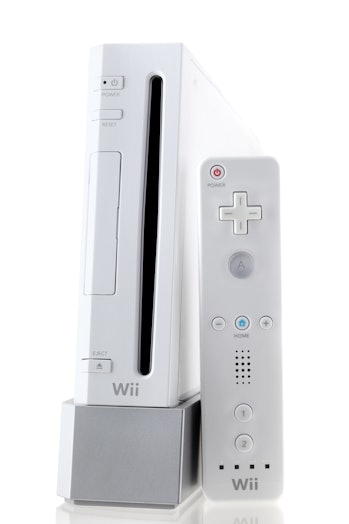 Providence, RI, USA - March 13, 2011: A white Nintendo Wii console and WiiMote controller made by Ni...