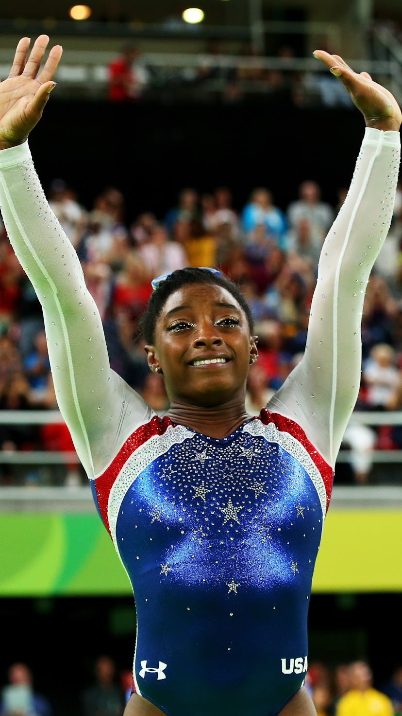 RIO DE JANEIRO, BRAZIL - AUGUST 11:  Simone Biles of the United States waves to fans after winning t...