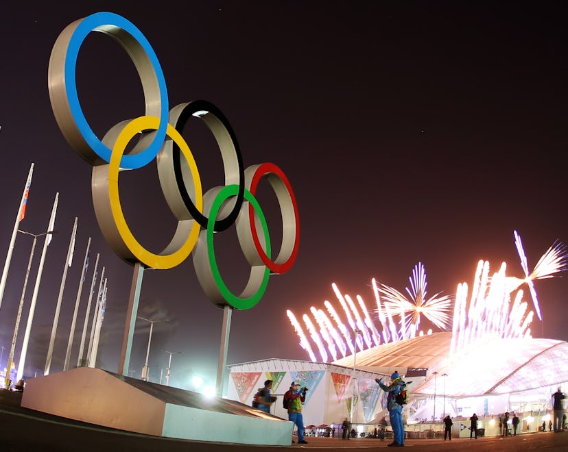 The Olympic Rings are seen as fireworks explode during the Closing Ceremony in Fisht Olympic Stadium...