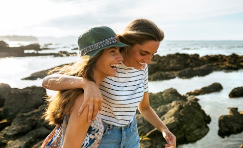 A woman supports her friend after a bad breakup. Experts & people who've been there share how to hel...