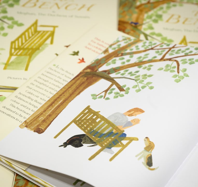 LONDON, ENGLAND - JUNE 08: A illustration of a father and son are seen inside a copy of Meghan Markl...