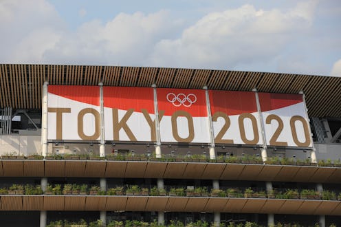 TOKYO, JAPAN - 2021/06/25: A view of the Olympic Stadium with Tokyo 2020 Olympic Games branding. (Ph...