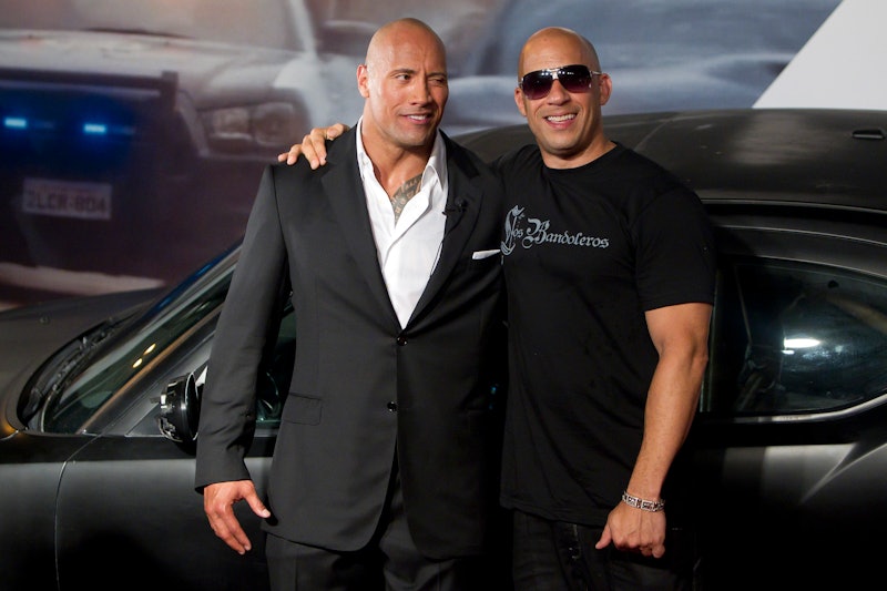 Dwayne Johnson (The Rock) and Vin Diesel (R) pose for photographers during the premiere of the movie...