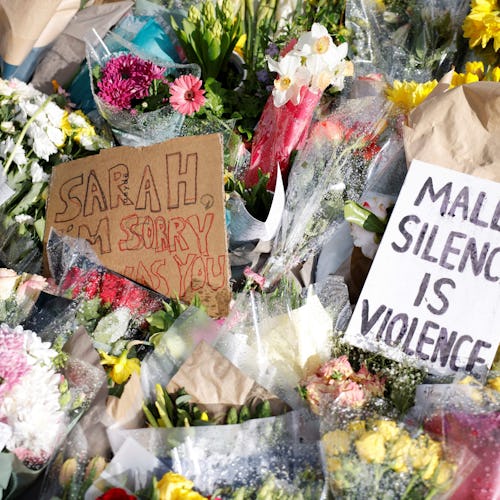 Floral tributes and messages in honour of Sarah Everard, the missing woman whose remains were found ...