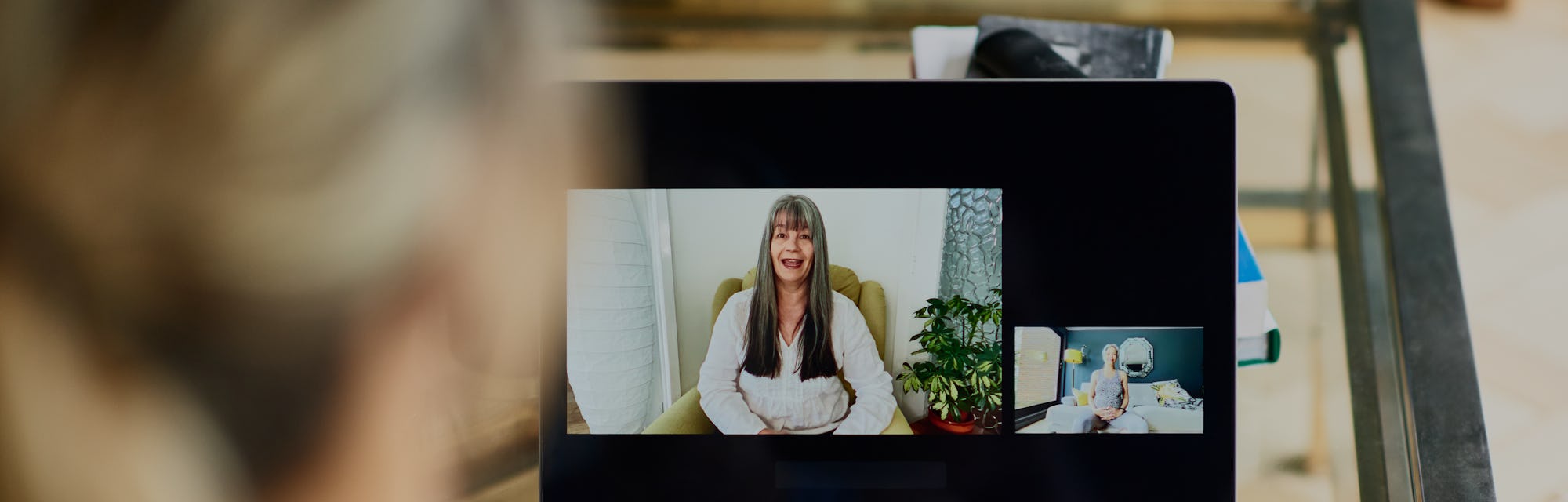 Mature women communicating on internet during therapy session, friends talking on video call, woman ...