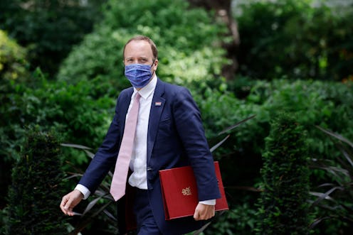 Britain's former Health Secretary Matt Hancock walks along Downing Street
