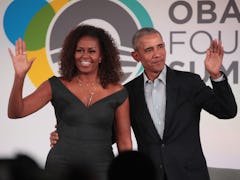 CHICAGO, ILLINOIS - OCTOBER 29: Former U.S. President Barack Obama and his wife Michelle close the O...