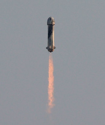 VAN HORN, TEXAS - JULY 20:  Blue Origin’s New Shepard flies into space from the launch pad carrying ...
