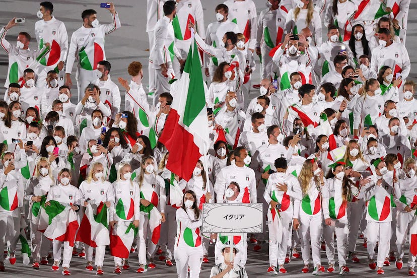 Italian Olympic team wears EA7 Emporio Armani uniform, courtesy of Giorgio Armani, while taking part...