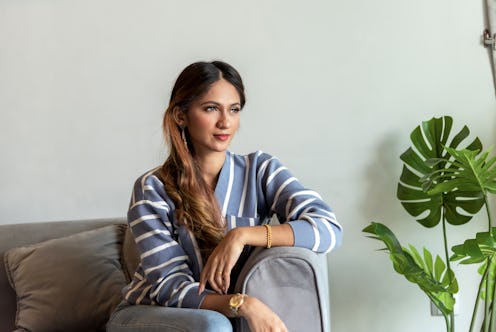 woman sitting in her living room