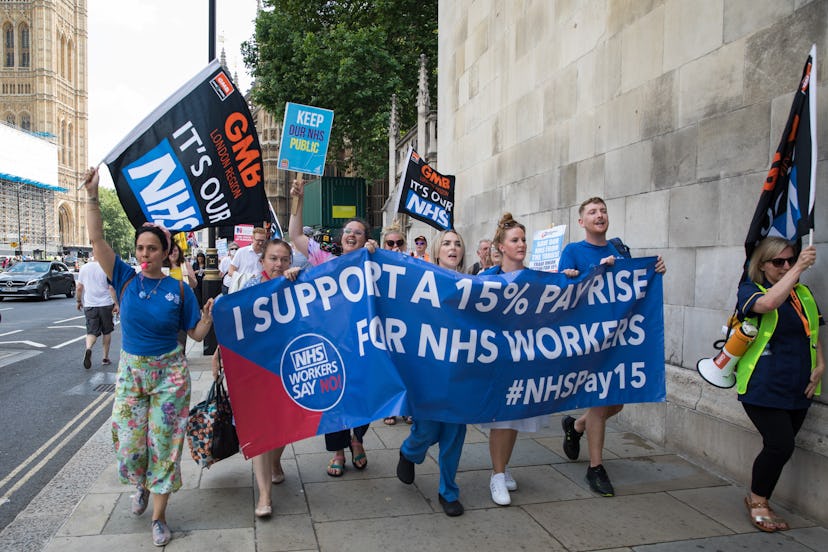 NHS workers from the grassroots NHSPay15 campaign march from Parliament to 10 Downing Street to pres...