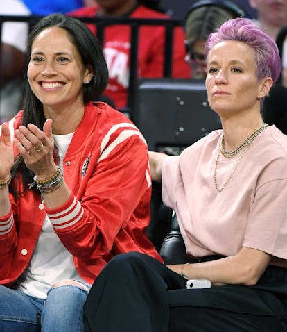 LAS VEGAS, NEVADA - JULY 27:  Sue Bird (L) of the Seattle Storm and soccer player Megan Rapinoe atte...