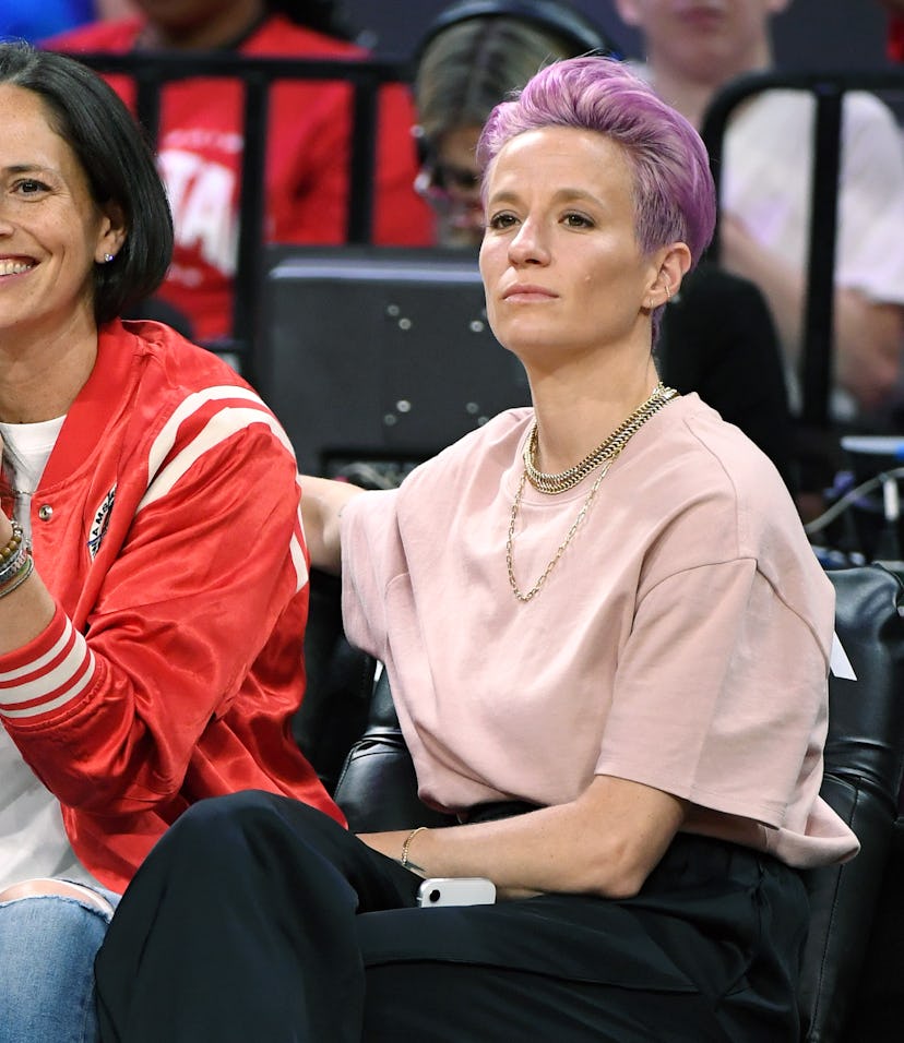 LAS VEGAS, NEVADA - JULY 27: Sue Bird (L) of the Seattle Storm and soccer player Megan Rapinoe atte...