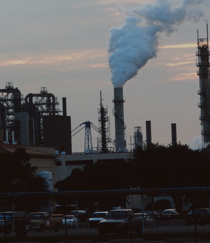 LOUISIANA- OCTOBER: Oil and chemical refinery plants cover the landscape, next to African American c...