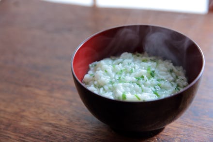 Rice porridge with seven herbs of spring called Nanakusa Gayu in lacquered bowl on January 7th in Ky...