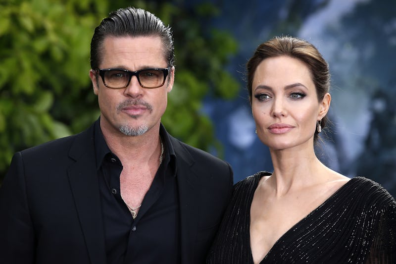 Brad Pitt and Angelina Jolie attending the premiere of Maleficent at Kensington Palace, London.   (P...