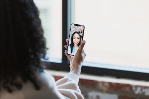 As part of the new normal after COVID-19, an unrecognizable businesswoman meets with her colleague u...