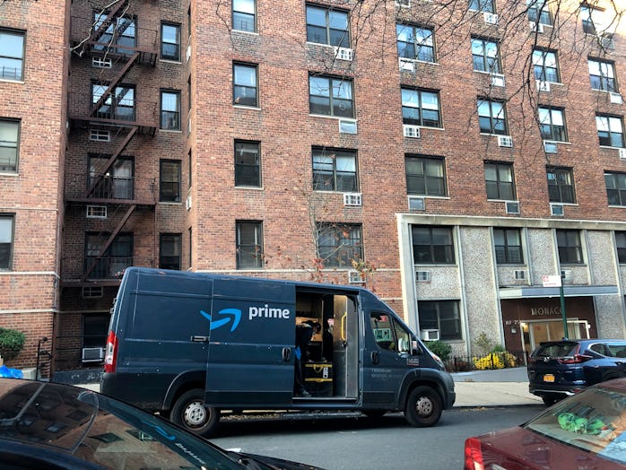 Amazon Prime delivery van parked outside apartment building, Forest Hills, Queens, NY. (Photo by: Li...