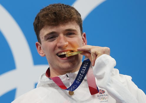 TOKYO, JAPAN - JULY 26: Matty Lee of Team Great Britain poses with the gold medal during the medal p...