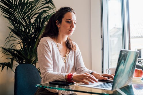 woman working on her laptop
