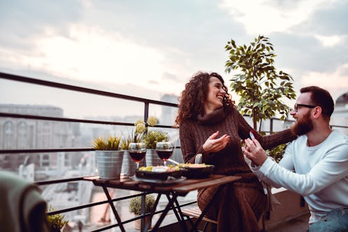 Male Using Rooftop Dinner Date To Propose To Girlfriend