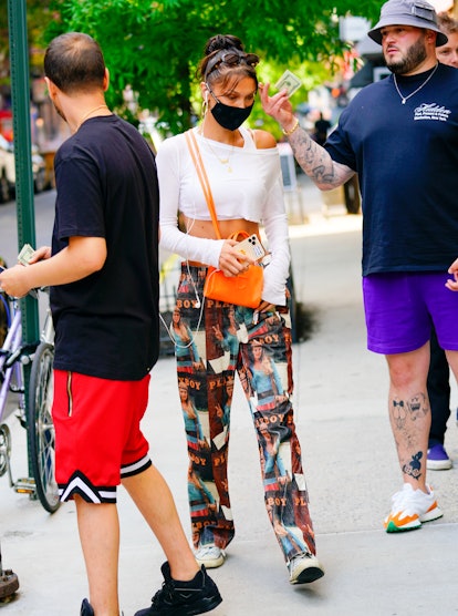 NEW YORK, NEW YORK - JULY 02: Bella Hadid is seen wearing a protective face mask during the COVID-19...