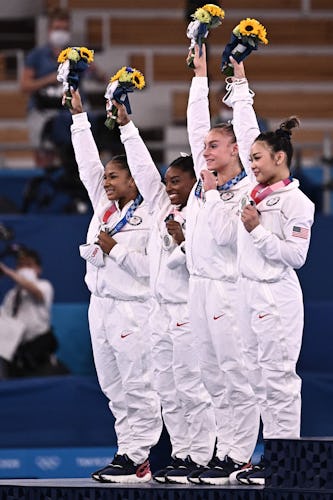 Team USA gymnastics team on the medal podium at the 2021 Olympics. Here's how to use TikTok's 2021 O...