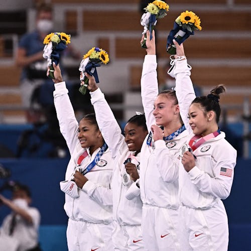 Team USA gymnastics team on the medal podium at the 2021 Olympics. Here's how to use TikTok's 2021 O...