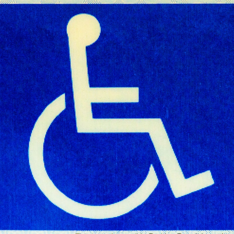 Blue and white Handicap Sign